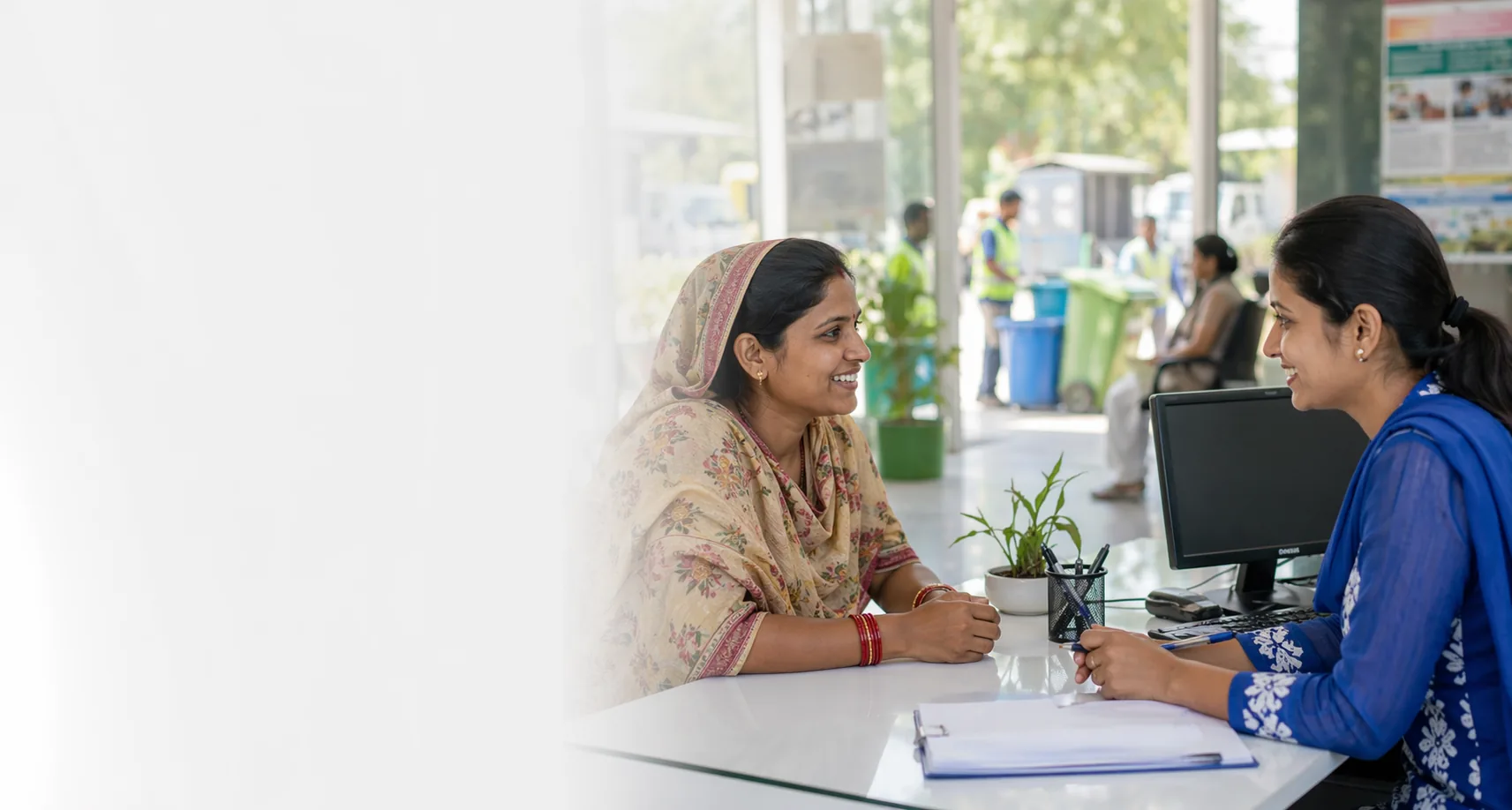 Citizen receiving assistance at a public complaint helpdesk