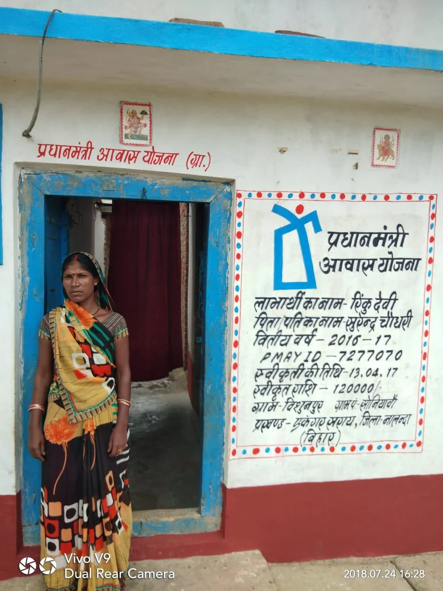PMAY-G beneficiary outside completed home